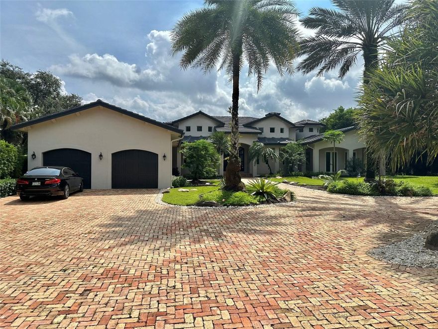 ****EXTRAORDINARY FULLY REMODELED ESTATE ON 2.35 LUSH ACRES!!!!!**** THE MAIN HOUSE CONSISTS OF 5 BEDROOMS WITH 5 FULL ENSUITE BATHS, BONUS ROOM, OFFICE AND A BRIGHT OPEN LIVING SPACE WITH EXTRA HIGH CEILINGS. CUSTOM CHEFS' KITCHEN WITH TOP-OF-THE-LINE APPLIANCES AND MODERN PORCELAIN TILE THROUGHOUT. ATTACHED IN- LAWS QUARTERS/BILLIARD OR ENTERTAINMENT ROOM. MAGNIFICENT MODERNIZED 3 BEDROOM 2 BATH GUEST HOUSE. RESORT STYLE POOL, VERANDAS, BBQ AREA, PICKLEBALL COURT WITH TROPICAL LANDSCAPING. NEW ROOFS, IMPACT WINDOWS AND DOORS, NEW AC'S, GENERATOR, ETC. A COMPLETE ONE-OF-A-KIND PROPERTY IN THE HEART OF SUNSHINE RANCHES!!!!