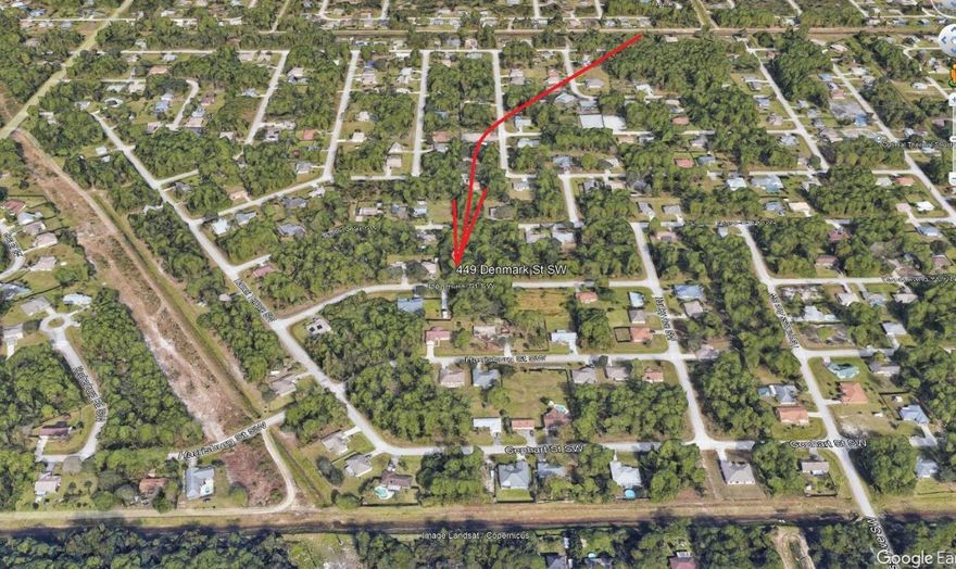 Discover this affordable 0.23-acre residential lot in the growing SW section of Palm Bay! Located in Port Malabar Unit 37, this 80x125 ft lot offers a great opportunity to build your dream home in a peaceful, wooded setting. Zoned RS2 for single-family use, this lot is close to schools (Bayside High & Westside Elementary), shopping (just 4 miles to Publix), and only 36 minutes to Indialantic beaches. Enjoy paved road access, with cable and electric available. With low annual taxes. Don't miss your chance to invest in this rapidly developing area!