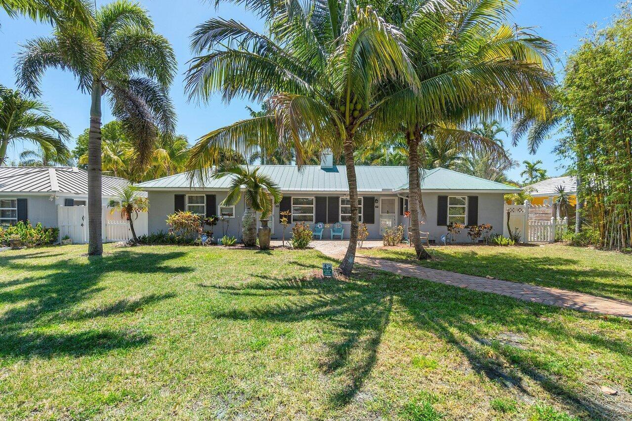 Walk to vibrant Atlantic Avenue and 5 minute stroll to Pineapple Grove Village. Only 1 mile to the beach from this beautifully updated cottage. This fully furnished and turnkey 2-bedroom, 1-bath apartment is located in the heart of Delray Beach. Available for annual lease or a minimum of four months during season and/or off season. This home comes fully equipped with everything you need to make you feel at home. Featuring a brand-new kitchen with new appliances, impact windows+shutters, new flooring throughout, both bedrooms comfortably accommodate king-size beds. Enjoy a fully equipped kitchen, security system, and a shared full-size washer and dryer on the property. Relax in the large fenced yard with a screened-in patio for your unit.No Cats. Dog are welcome with