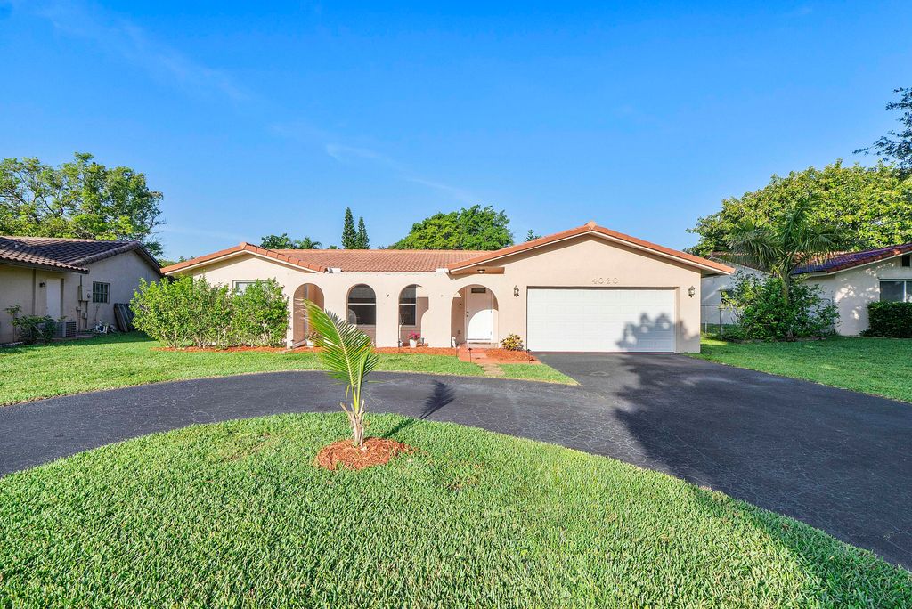 Photo of 4020 NW 113th Avenue, Coral Springs, FL 33065 (MLS # B26025012)