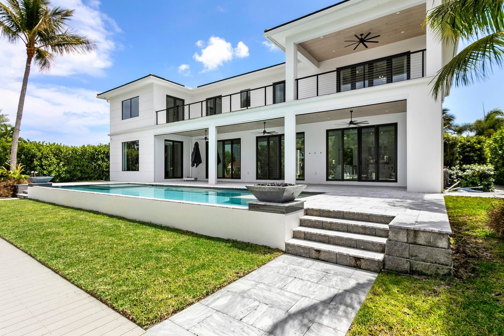 Photo of 619 Riverside Road, North Palm Beach, FL 33408 (MLS # B26014280)
