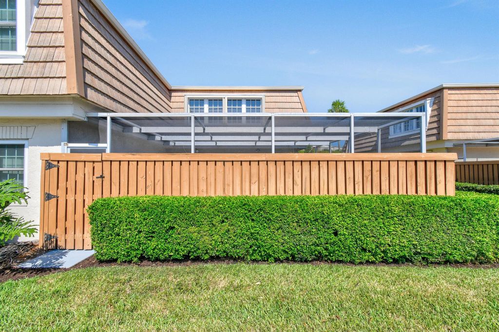 Photo of 11605 Winchester Drive #D, Palm Beach Gardens, FL 33410 (MLS # R10994683)