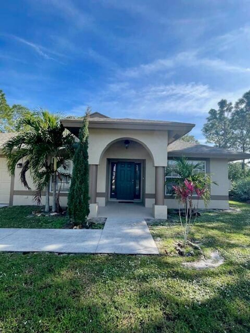 Photo of 5869 NW Carovel Avenue, Port Saint Lucie, FL 34986 (MLS # R11057464)