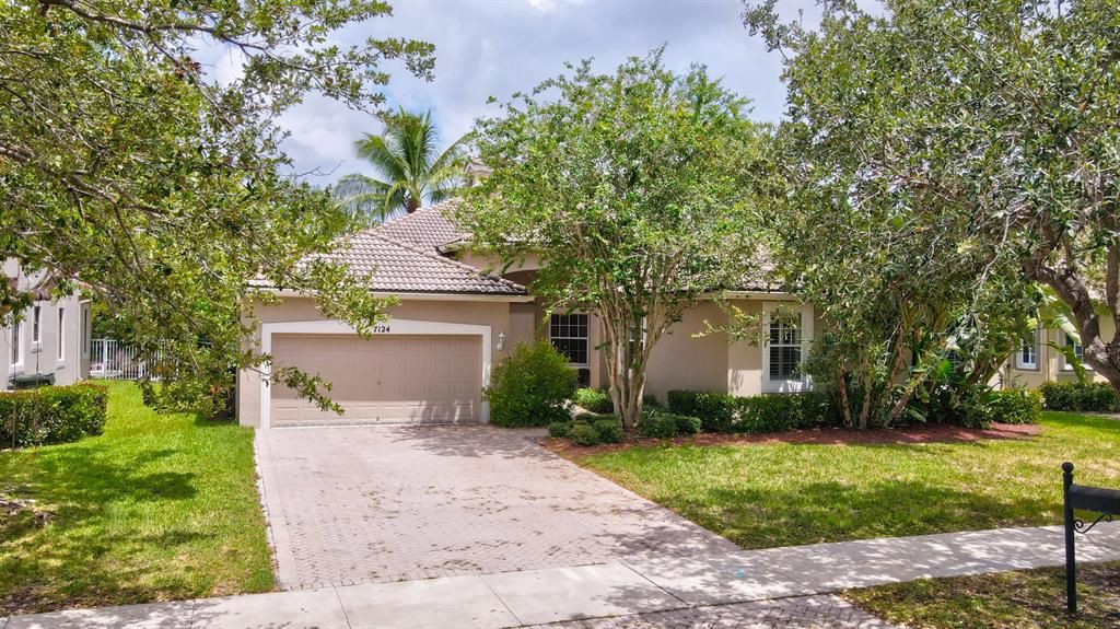 Photo of 7124 NW 47 Lane Ln, Coconut Creek, FL 33073 (MLS # R10823904)