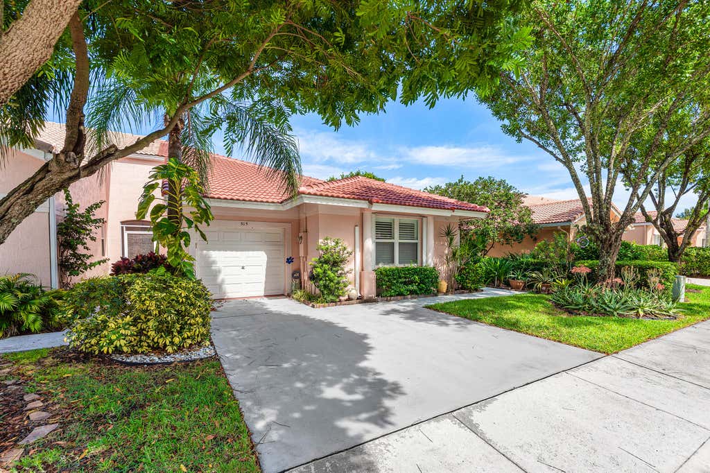 Photo of 315 CORAL TRACE Lane, Delray Beach, FL 33445 (MLS # B26060288)