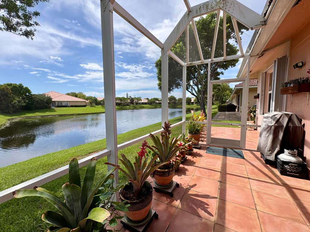 Photo of 315 CORAL TRACE Lane, Delray Beach, FL 33445 (MLS # B26060288)