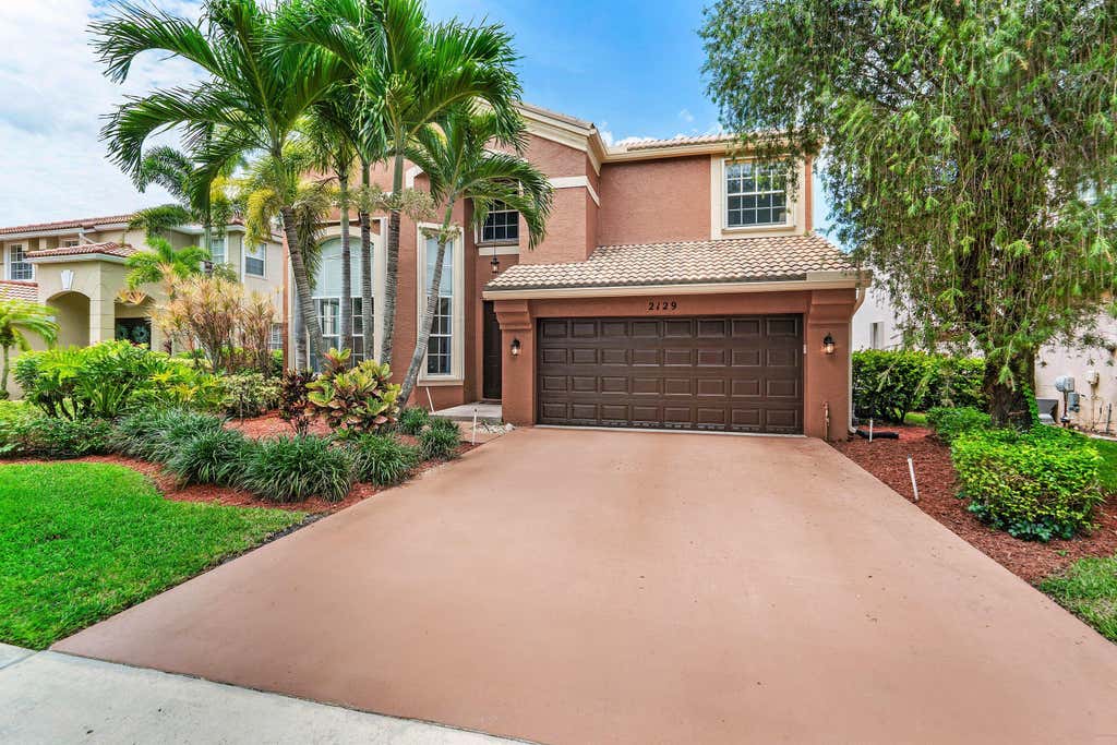 Photo of 2129 RESTON Circle, Royal Palm Beach, FL 33411 (MLS # B26058570)