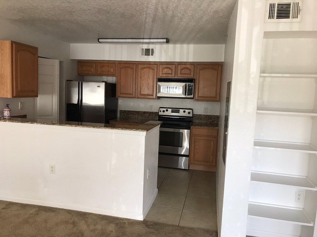 Photo of 251 SW Palm Drive #101, Port Saint Lucie, FL 34986 (MLS # R10781817)