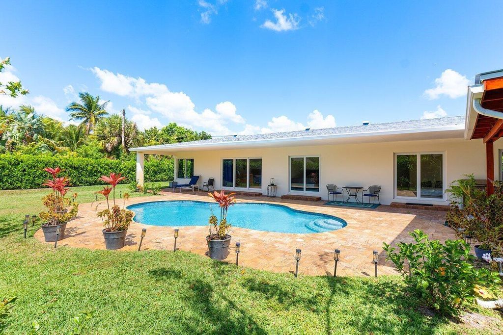 Photo of 1650 NE 3rd Avenue, Delray Beach, FL 33444 (MLS # B26018069)