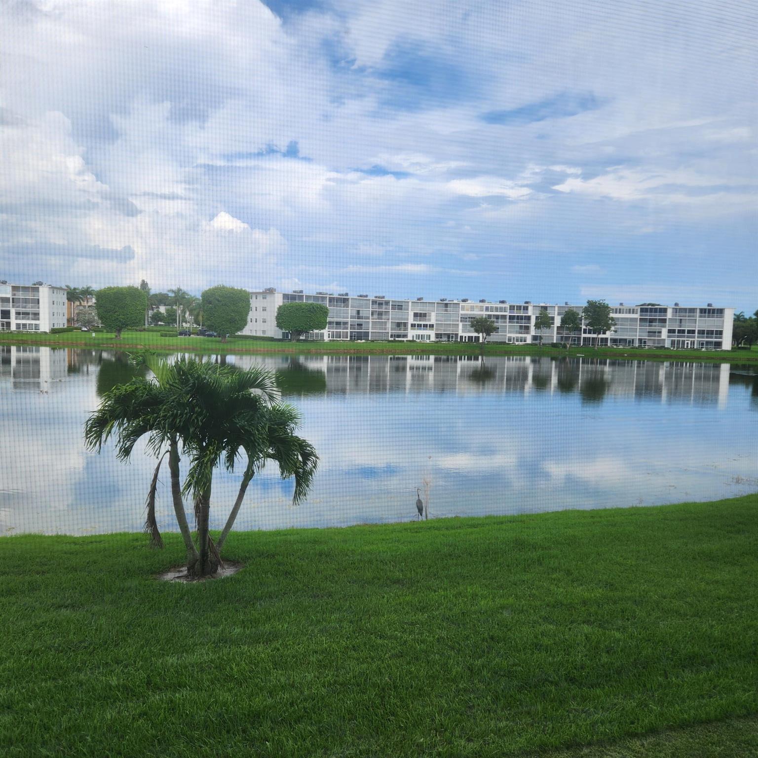 Welcome to Century Village in beautiful Boca Raton, FL! This charming 2-bedroom, 1.5-bath condo offers the perfect combination of comfort, convenience, and value. With endless potential to make it your very own ''Slice Of Paradise'' this unit is freshly painted and ready for your personal touch. The condo features a stunning lake view that provides a serene and peaceful backdrop.Bonus: Can be rented immediately -- a fantastic opportunity for both homeowners and investors!Enjoy the incredible lifestyle Century Village is known for, with resort-style amenities including a clubhouse, fitness center, pools, tennis, pickle ball, entertainment, courtesy bus and so much more -- all in a vibrant 55+ community.