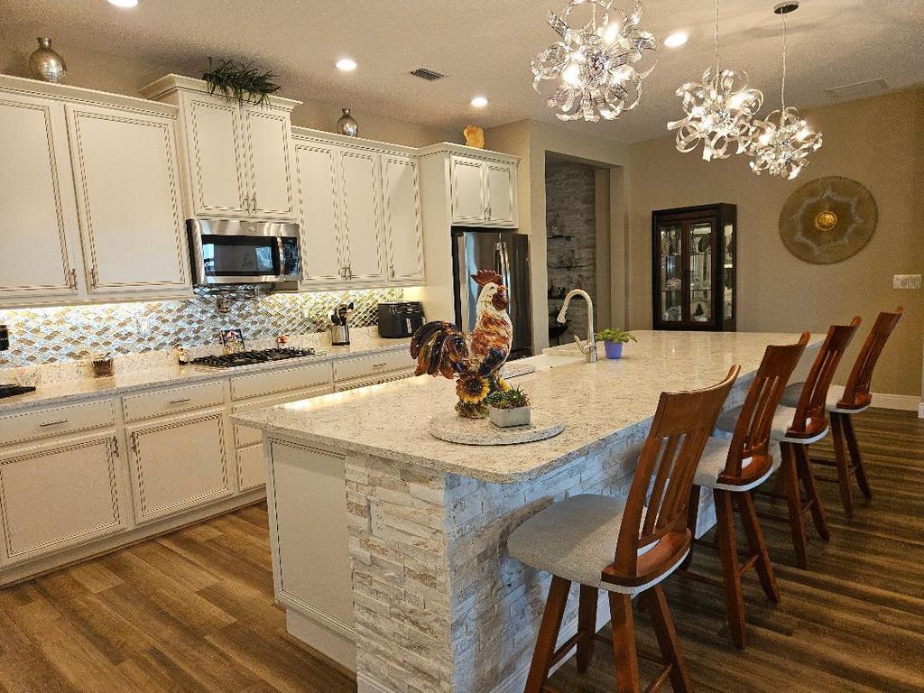 Photo of 10063 SW Coral Tree Circle, Port Saint Lucie, FL 34987 (MLS # R11165939)
