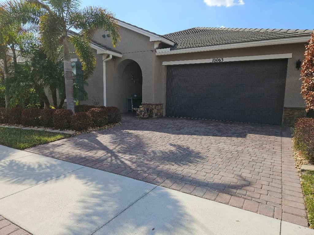 Photo of 10063 SW Coral Tree Circle, Port Saint Lucie, FL 34987 (MLS # R11165939)
