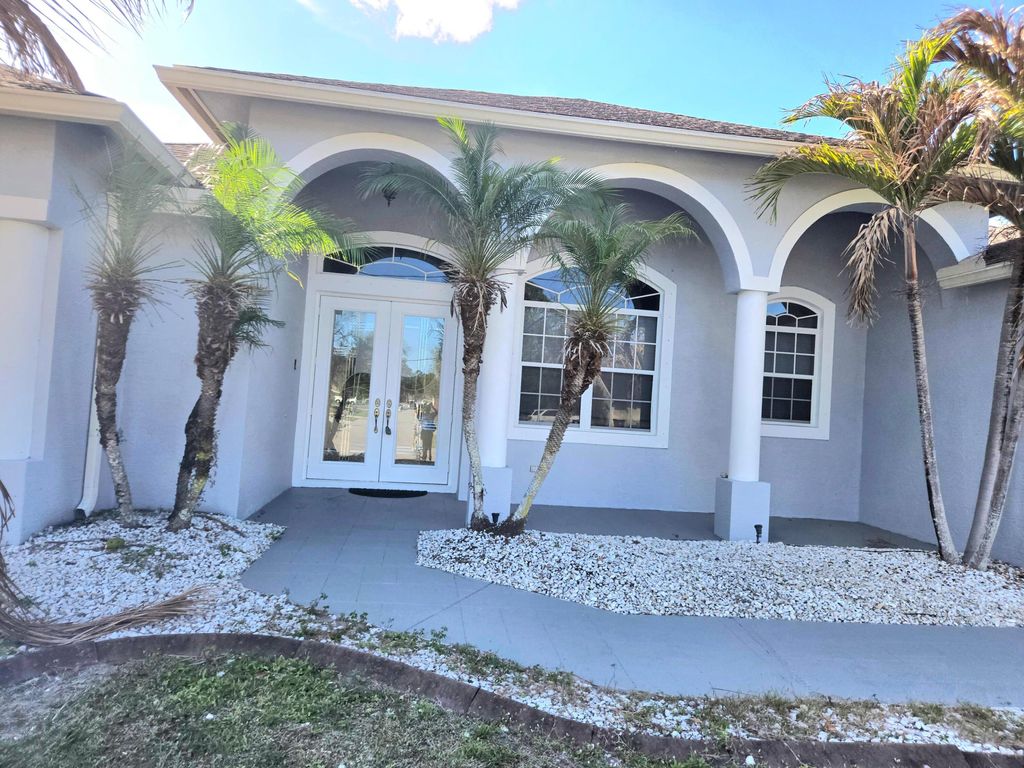 Photo of 2472 SW Valnera Street, Port Saint Lucie, FL 34953 (MLS # R11162674)