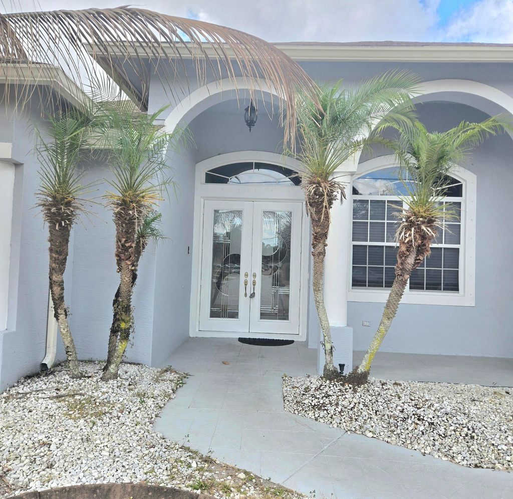 Photo of 2472 SW Valnera Street, Port Saint Lucie, FL 34953 (MLS # R11162674)