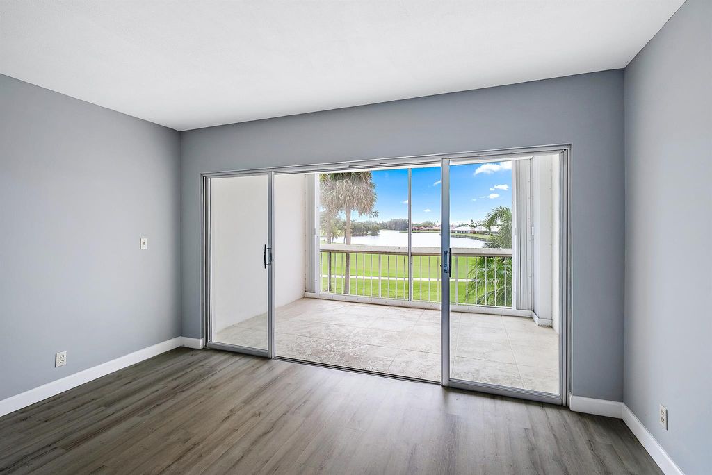 Photo of 169 Atlantis Boulevard #202, Atlantis, FL 33462 (MLS # R10941172)