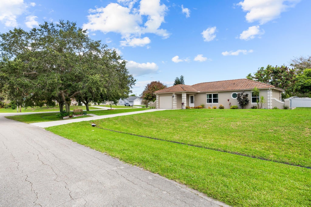 Photo of 265 SW DALTON Circle, Port Saint Lucie, FL 34953 (MLS # B26069404)