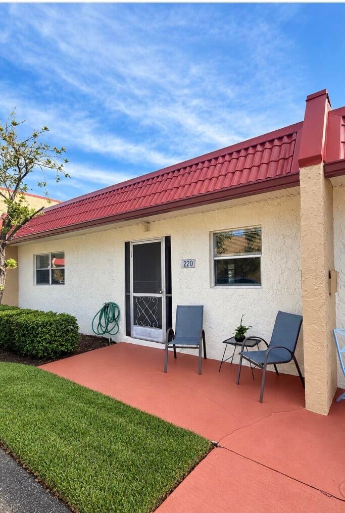 Photo of 220 LAKE DORA Drive, West Palm Beach, FL 33411 (MLS # B26090352)