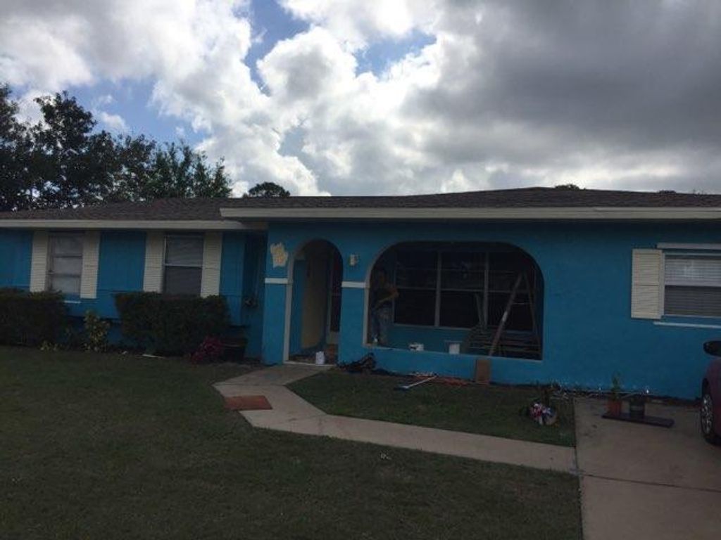 Photo of 110 S Naranja Avenue, Port Saint Lucie, FL 34983 (MLS # R10682609)