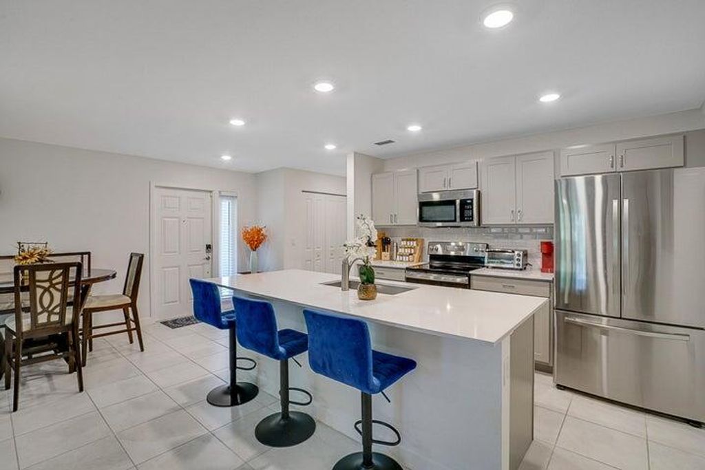 Photo of 6765 Broadwater Lane, Lake Worth, FL 33467 (MLS # R11113624)