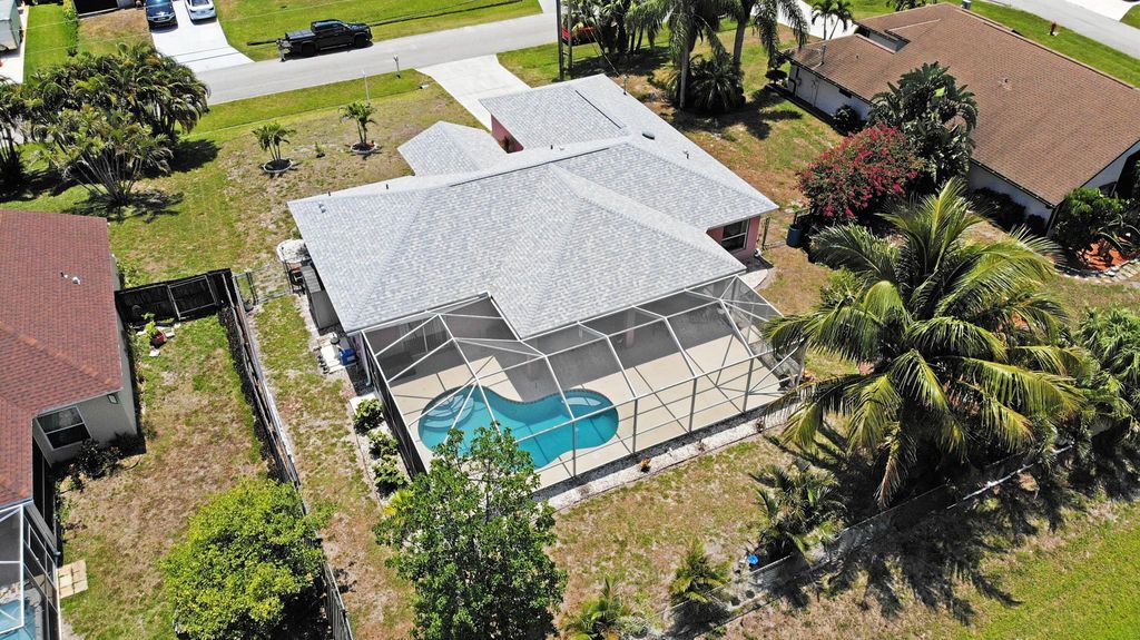 Photo of 771 SW Estate Avenue, Port Saint Lucie, FL 34953 (MLS # R11089030)