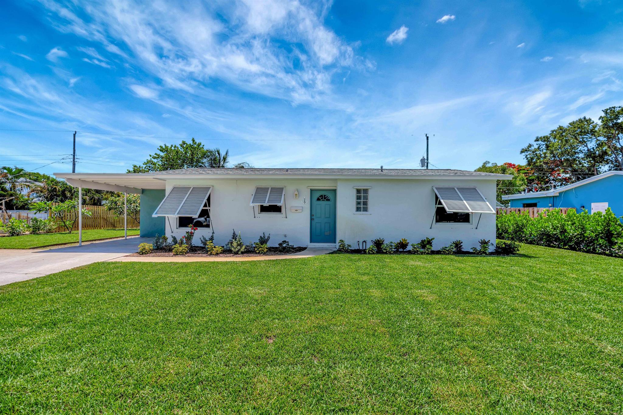 Incredible opportunity to rent (annually) this beautifully Updated 3 BR, 2 Bath plus a den/office, single family ranch with all newer tile floors and an attached carport! For a 2 year lease, Owner will reduce monthly rent to $3,500. Home Features; Complete new landscaping, lawn and plantings throughout the property. This meticulously maintained single family home has a great split floor plan, a chef's gourmet kitchen, and has an oversized property with a huge backyard space. Make yourself at home and enjoy the lifestyle that North Palm Beach has to offer. Conveniently located to all shops, dining, and restaurants, this quaint area is truly a hidden gem. Updated kitchen and SS appliances makes this home North Palm living at its finest. Very quiet neighborhood and NO HOA!