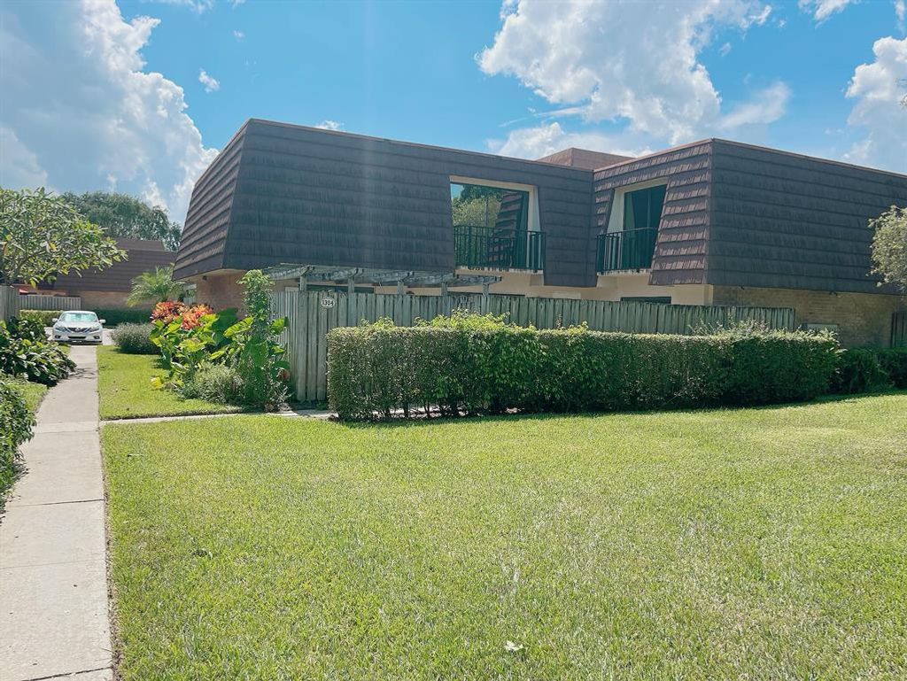 Photo of 1304 13th Lane Ln, Palm Beach Gardens, FL 33418 (MLS # R10831115)