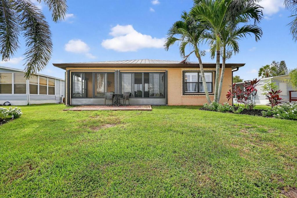 Photo of 14550 Dulce Real Avenue, Fort Pierce, FL 34951 (MLS # R11110348)