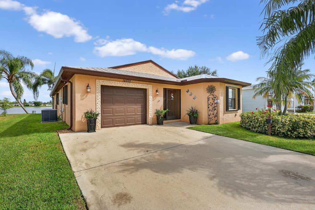 Photo of 14550 Dulce Real Avenue, Fort Pierce, FL 34951 (MLS # R11110348)
