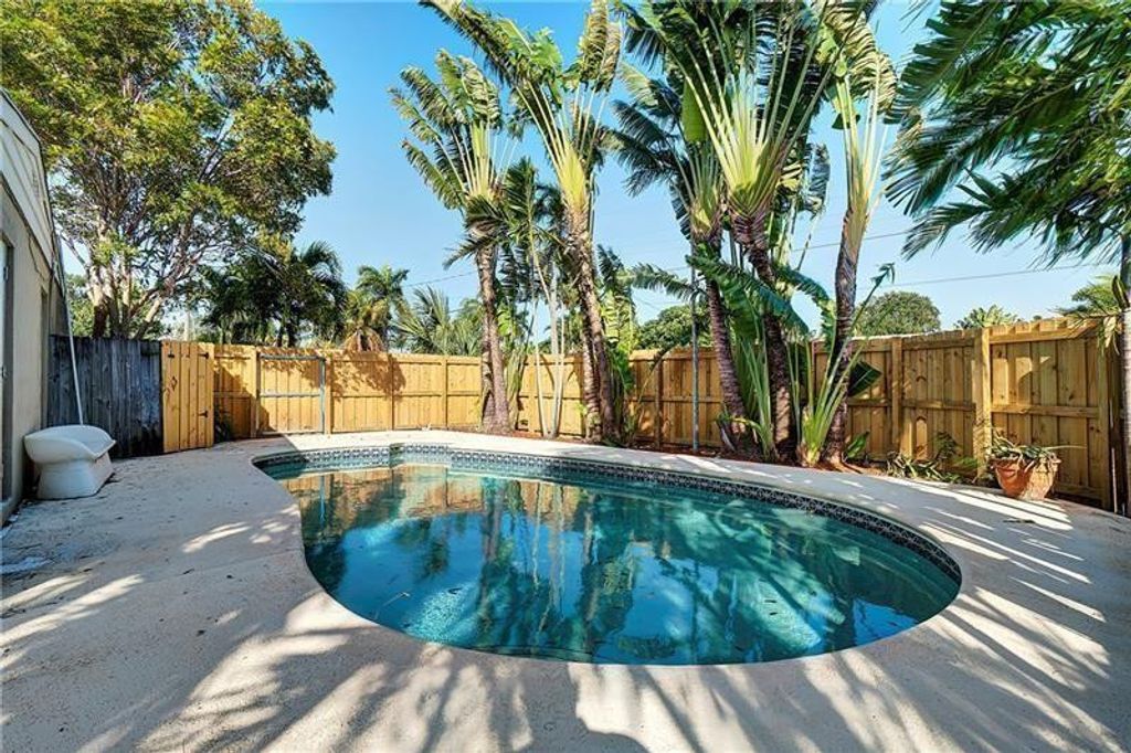 Photo of 1598 NE 36th Street, Oakland Park, FL 33334 (MLS # F10523393)