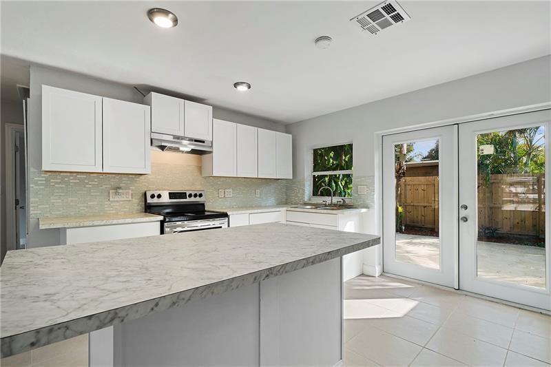 Tenant occupied until September 14th. Schedule with 1 day notice. Conveniently situated in the eastern part of Fort Lauderdale, this property is located just a few miles away from the beautiful beach, vibrant shopping centers, and exciting nightlife. Offering a cozy 2-bedroom, 1-bathroom layout, this home also features a refreshing pool and a 2-car garage primarily designed for storage purposes as it doesn't have an electric operating mechanism. The landlord is seeking highly qualified tenants with strong credit ratings, a positive rental history, and the ability to meet screening requirements. Small pets may be considered, one pet max. With a total area of under 900 square feet, the lawn and pool maintenance are taken care of by the owner. First, last, and security deposits.