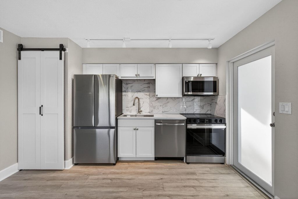Photo of 624 Southwind Circle #1, North Palm Beach, FL 33408 (MLS # B26013592)