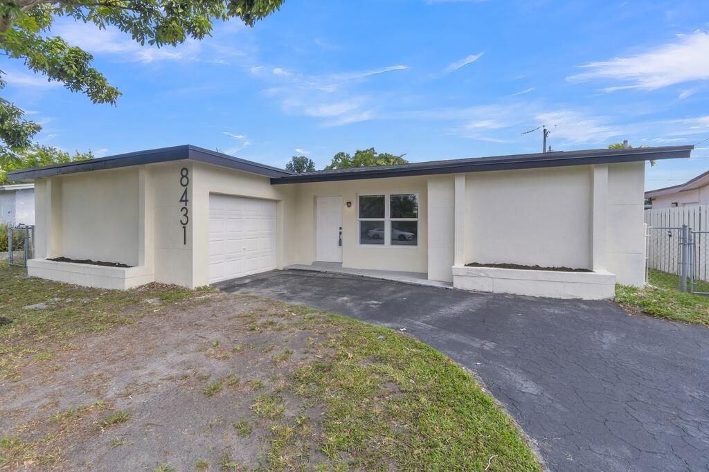 Photo of 8431 NW 27th Place, Sunrise, FL 33322 (MLS # B26021689)