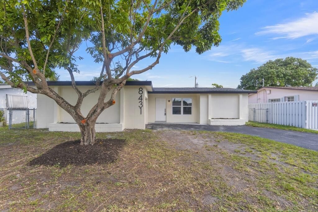Photo of 8431 NW 27th Place, Sunrise, FL 33322 (MLS # B26021689)