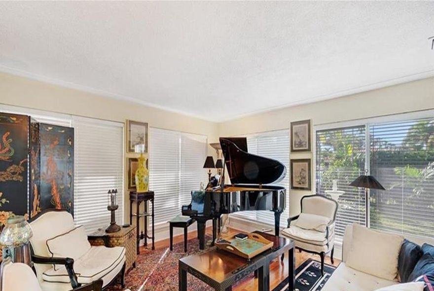 PLEASE TAKE THE 3-D TOUR OF THIS UNIQUE PROPERTY! Live in the main house and collect rental income from the guest house at the same time. Main house has three bedrooms and three full baths. The guest house has two bedrooms, one full bath, kitchen and living area, is on a separate meter, and has it's own entrance from the street. This unique property has too many features for us to list them all here! Enjoy the privacy of living in your own fenced and gated compound just blocks from holiday park and Las Olas. Huge pavered area around the heated pool. This is a great place to entertain or just enjoy being outdoors in sunny south Florida! Chef's kitchen, triple-split bedroom floor plan, landscaped lot, and much, much more! What are you waiting for?