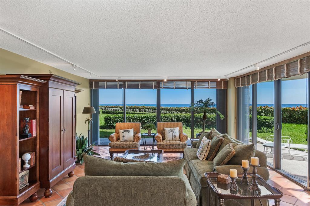 Beautiful south/east facing 2 bedroom, 2 bath first floor condo with ocean views. Lives like a beach house. Step out through impact doors to your patio or go directly to the gorgeous pool, beach, gazebo and barbecue. This condo features a large master suite and 1740 SF under air. Located in a prestigious oceanfront building, Atriums offers every amenity including 24/7 door person, state of the art gym, tennis, new lobbies and garage parking. Cabana located next to condo is offered for sale as well. Don't miss this well-priced apartment.