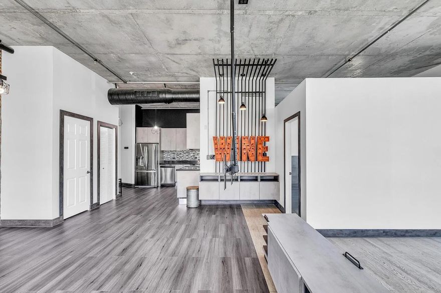 Modern industrial-style loft for rent at 2100 Van Buren St, Hollywood. This beautifully renovated unit features soaring concrete ceilings, new flooring, and a smartly designed separated bedroom area, offering more privacy than a typical loft. The unit includes a modern kitchen with stainless steel appliances, a stylish spa-like bathroom, and large windows that fill the space with natural light. Located in The Lofts at Hollywood Station, residents enjoy amenities including a pool and secured entry. Just steps from Downtown Hollywood, Young Circle, top restaurants, cafés, bars, and entertainment, and only minutes from Hollywood Beach. Perfect for professionals who want style, convenience, and walkable city living.