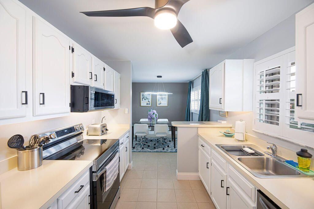 Photo of 29 Lake Vista Trail #207, Port St Lucie, FL 34952 (MLS # R10886606)