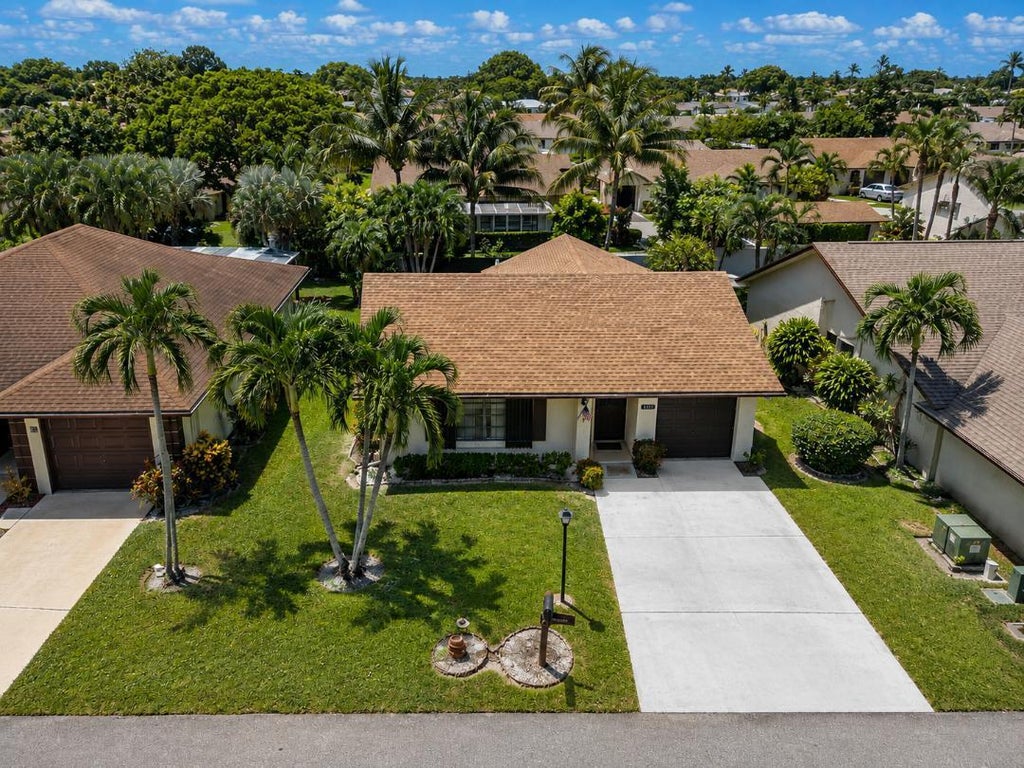 Photo of 6310 TALL CYPRESS Circle, Greenacres, FL 33463 (MLS # B26063625)