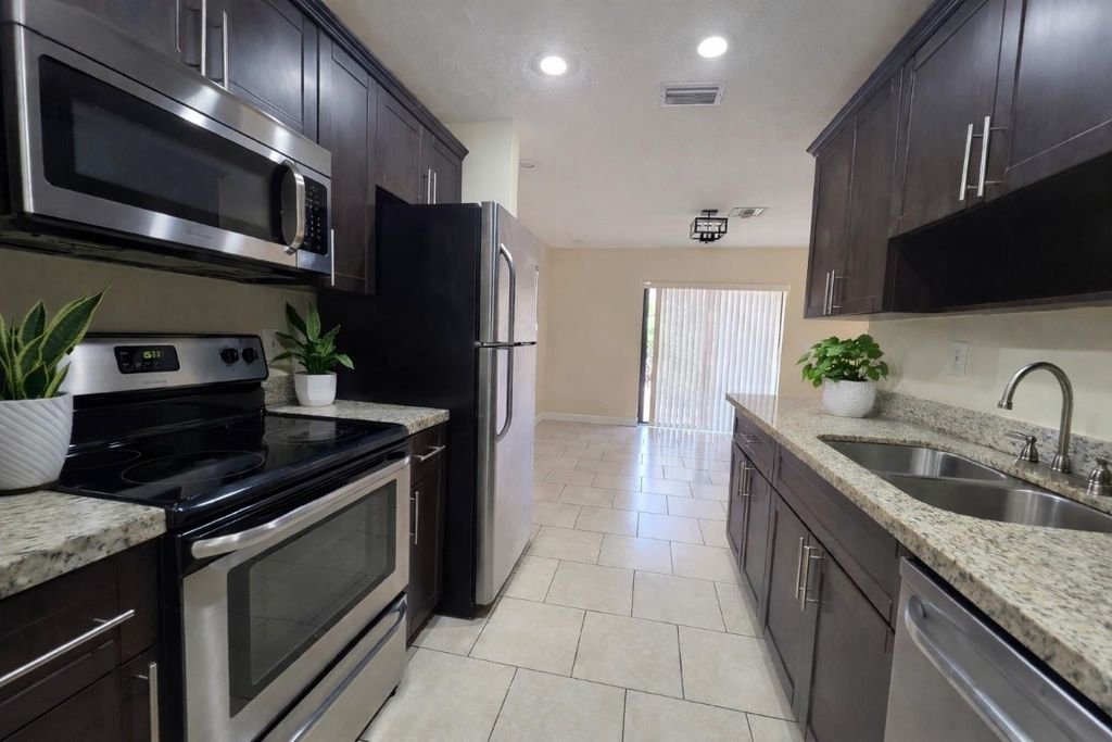 Photo of 3591 NW 78th Lane, Coral Springs, FL 33065 (MLS # F10544507)