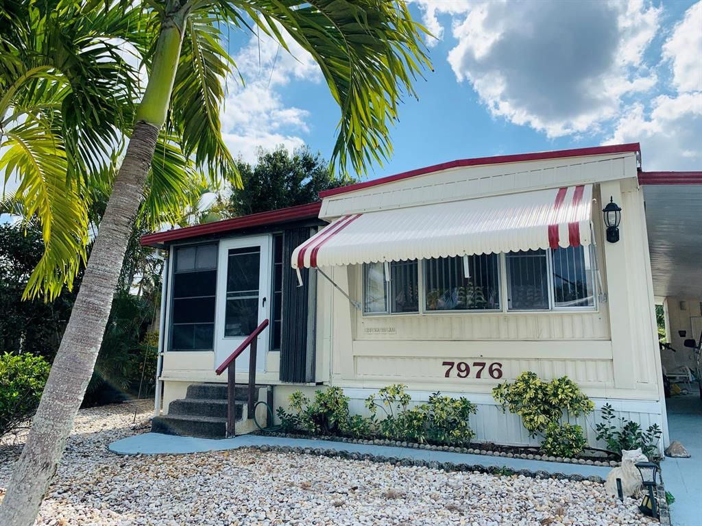 Photo of 7976 SE Wren Avenue, Hobe Sound, FL 33455 (MLS # R10711778)