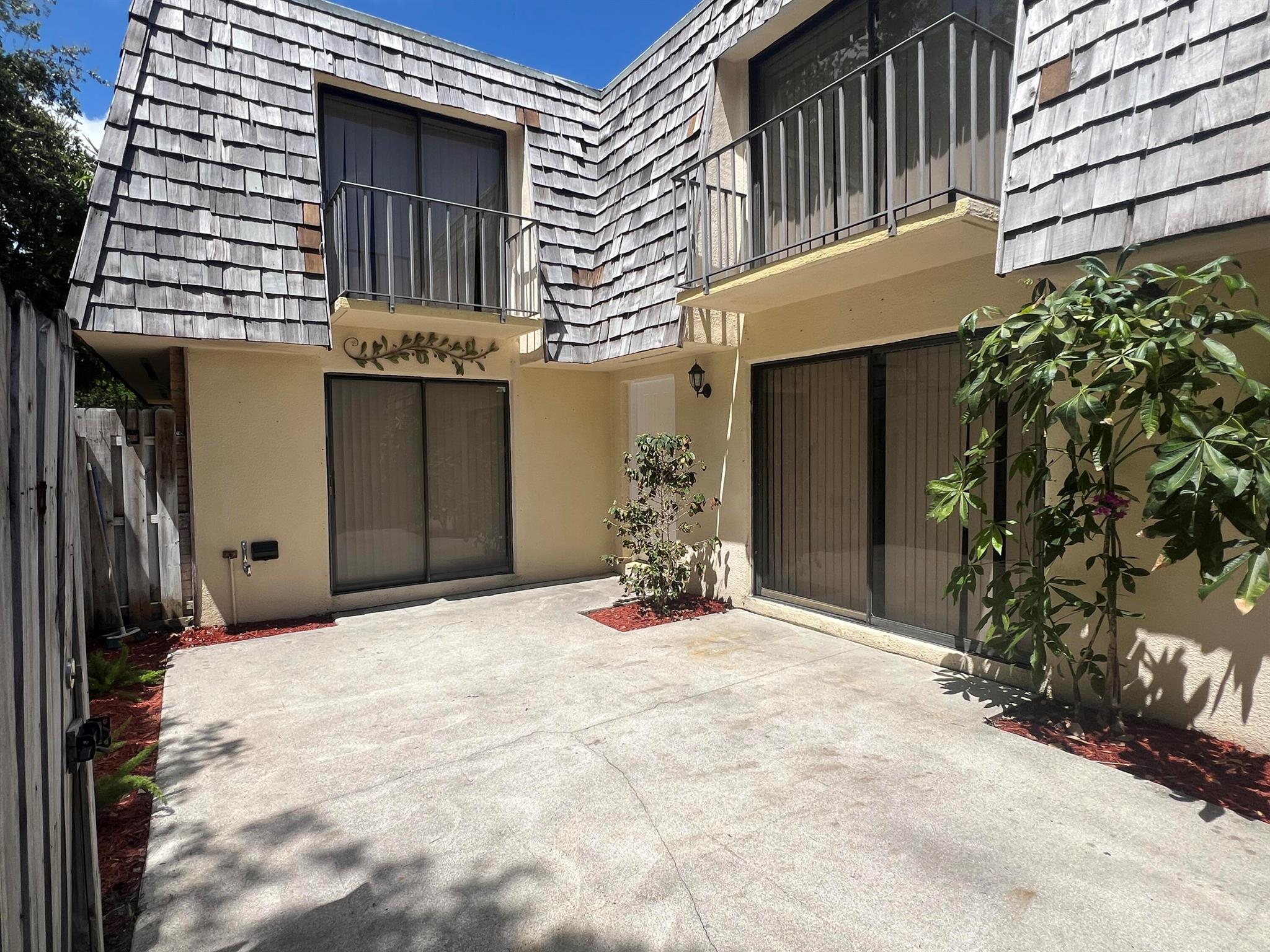 Welcome to this well-kept 1274 sq ft, 2-bedroom, 2-bath townhouse, perfectly located in a desirable family-friendly neighborhood. The home offers a comfortable layout with separate living, and kitchen areas, creating distinct spaces for everyday living. The A/C unit was replaced just one year ago, offering peace of mind and energy efficiency. Enjoy the benefits of a low HOA while being just minutes from Publix, Walmart, local dining, and main streets for an easy commute. The community provides a safe and welcoming environment, ideal for families or anyone seeking a peaceful yet convenient location. Whether you're a first-time buyer, downsizing, or investing, this townhouse offers excellent value in a prime location.