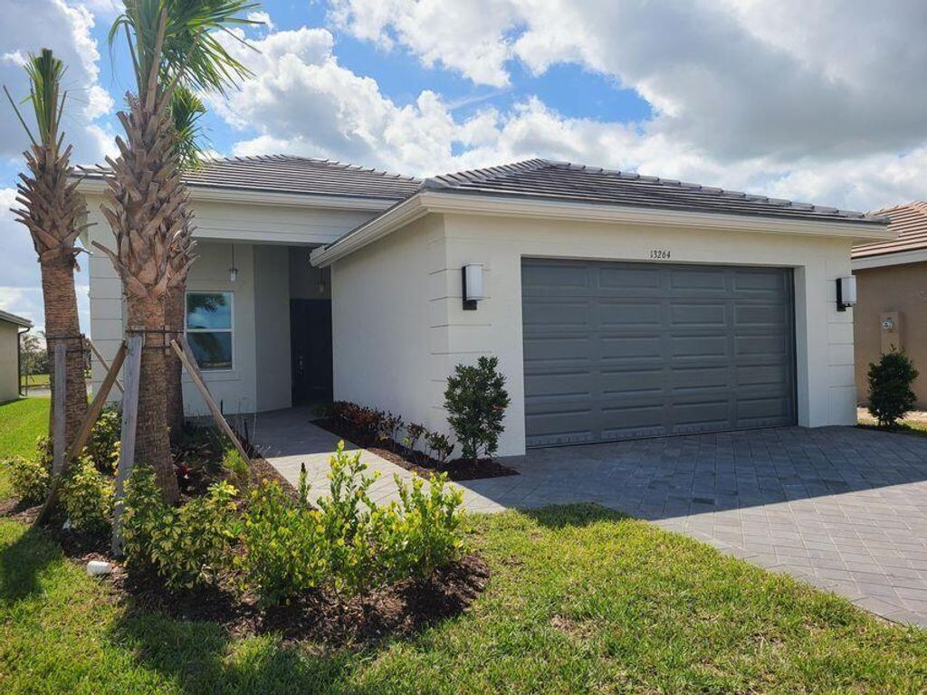Photo of 13264 SW Blue River Road, Port Saint Lucie, FL 34987 (MLS # R10972024)