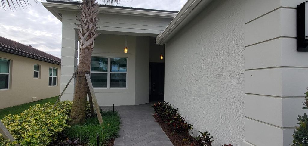 Photo of 13264 SW Blue River Road, Port Saint Lucie, FL 34987 (MLS # R10972024)