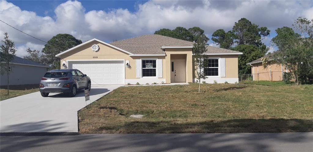 Photo of 2019 SW Bellevue Avenue, Port Saint Lucie, FL 34953 (MLS # F10549016)