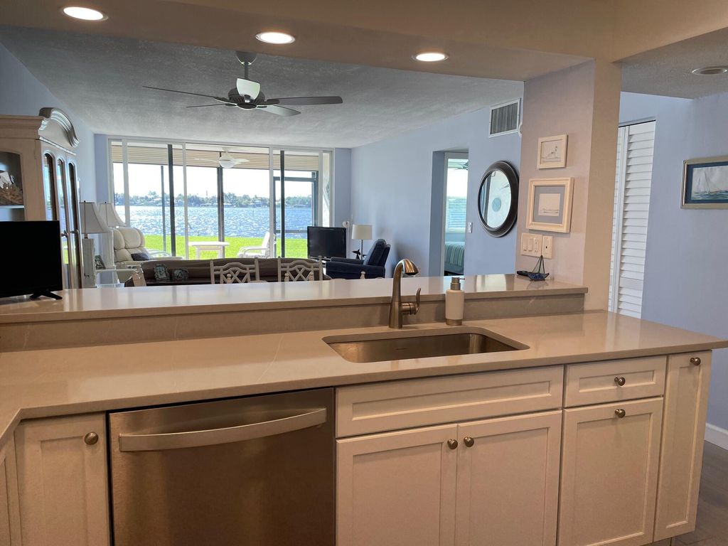 Photo of 1950 SW Palm City Road #13-104, Stuart, FL 34994 (MLS # R10978029)