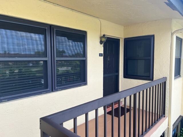 May need to be a longer than usual closing. 2 Bed / 2 Bath unit located in the highly desirable ALL AGE section of Lucerne Greens community. Very open & airy with high ceilings. Impact Glass, Beautiful golf course views from the living/dining room, screened in patio and master bedroom. Washer & dryer located in the unit, tons of closet space. The condo is located within walking distance of the clubhouse and pool. Hoa includes basic cable & water. Close proximity to the local shops, dining, FL Turnpike and major international airports, beaches, city place, entertainment, malls basically whatever your heart desires.Water heater is new in January 2022, AC outside unit is a year old, garbage disposal is new appliances are stainless steel, (dishwasher does not work)