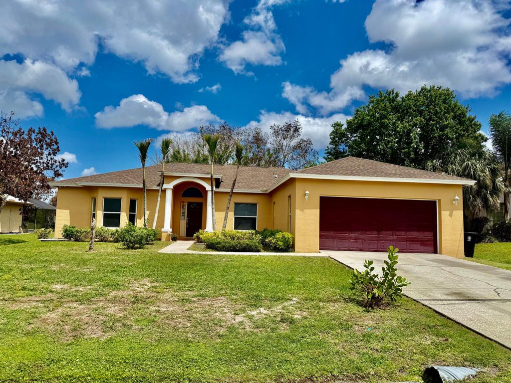 Photo of 6752 NW Argus St, Port Saint Lucie, FL 34983 (MLS # B26020065)
