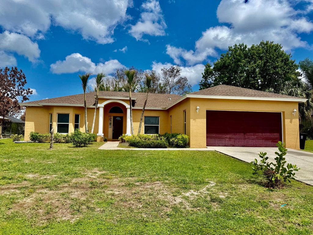 Photo of 6752 NW Argus St, Port Saint Lucie, FL 34983 (MLS # B26020065)