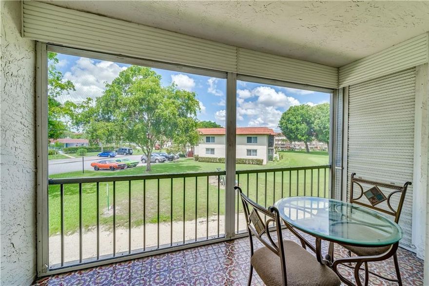 Full Two Bedroom With Par 3 Golf Course View-White Kitchen-All Wood Flooring-Popcorn Ceiling Has Been Removed-Some Upgrades In Bathrooms-Upgraded A/C-Freshly Painted-All Windows And Sliding Glass Doors Have Hurricane Code Shutters-Total Appliance Contract Can Be Pro-rated At Closing-Steps To Pool And Parking-Extra Storage-Paid Up Rec Lease Is Included- Free golf , 14 tennis courts, 7 pools, theater, fitness center, restaurant , 24 hr security,. Assoc. represents housing for older persons authorized (HOPA)..   *** IMPORTANT! See Broker Remarks below for occupancy qualifications. Free golf, 24 hr security, tennis, restaurant, bus, theatre, fitness center and more