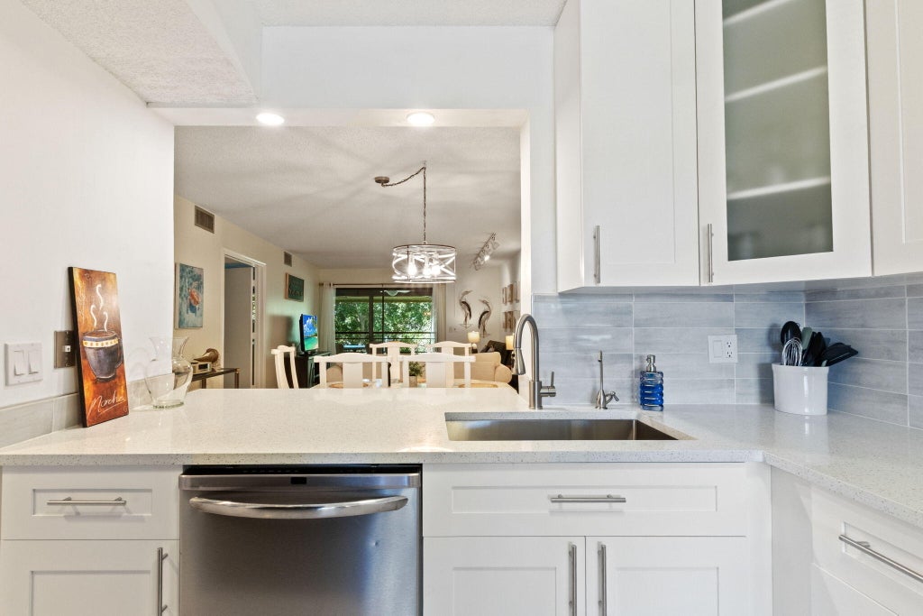 Photo of 5380 CEDAR LAKE Drive #304, Boynton Beach, FL 33437 (MLS # B26078563)